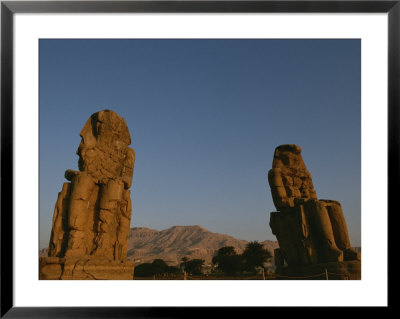 A View Of The Crumbling Colossi Of Memnon by Kenneth Garrett Pricing Limited Edition Print image