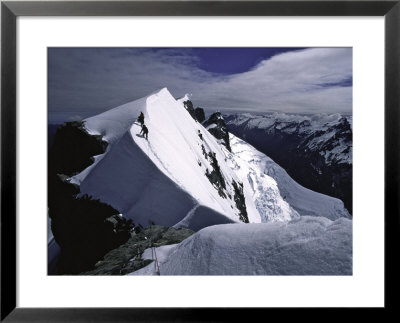 Climbers Hike Up Ridge On Mt. Aspiring, New Zealand by Michael Brown Pricing Limited Edition Print image