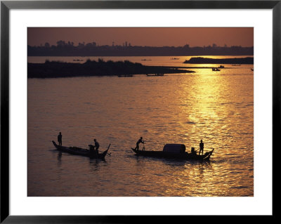 Boats Silhouetted On The Mekong River At Dusk, Phnom Penh, Cambodia by Steve Raymer Pricing Limited Edition Print image