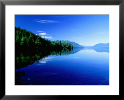 Reflections In Lake Mcdonald, Glacier National Park, Montana by Holger Leue Pricing Limited Edition Print image