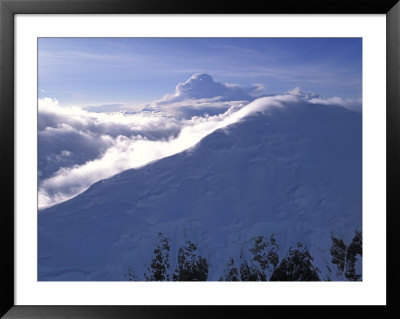 Aerial Of Mount Mckinley, Clouds Pouring Over Mount Capps, Alaska by Rich Reid Pricing Limited Edition Print image