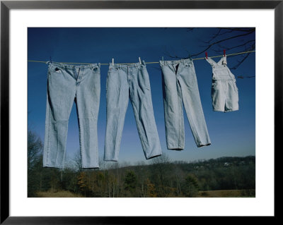Four Pairs Of Jeans Hanging On A Clothesline by Brian Gordon Green Pricing Limited Edition Print image