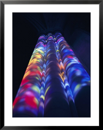 Bright Splashes Of Color Illuminate A Pillar by Stephen St. John Pricing Limited Edition Print image