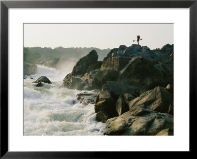 Kayaker Carries Boat Up The Rocks Of Great Falls On The Potomac River by Skip Brown Pricing Limited Edition Print image
