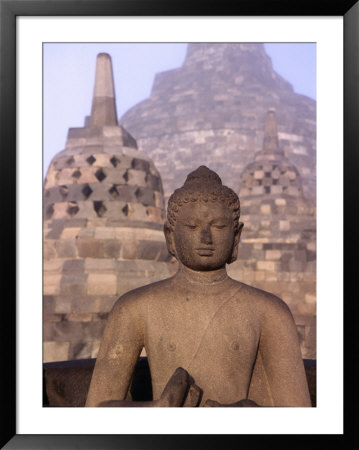 Large Buddha Image With Stupas In Background, Borobudur, Central Java, Indonesia by Bernard Napthine Pricing Limited Edition Print image