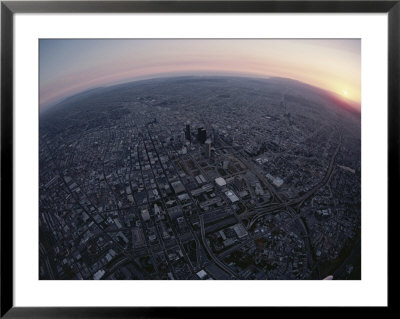 An Aerial Fisheye Lens View Of Los Angeles At Twilight by Jodi Cobb Pricing Limited Edition Print image