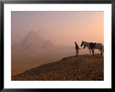 Dawn View Of Guide And Horses At The Giza Pyramids, Cairo, Egypt by Walter Bibikow Pricing Limited Edition Print image