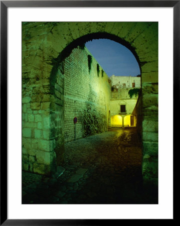 Archway In Old Walled Town Of D'alt Vila, Ibiza City, Balearic Islands, Spain by Jon Davison Pricing Limited Edition Print image