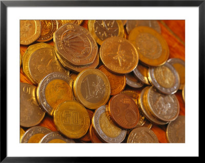 Coins, Including A One Euro Piece, Are Spread Out by Stephen Alvarez Pricing Limited Edition Print image