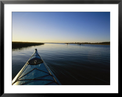 Kayakers Explore The Waterway Around Carrot Island by Stephen Alvarez Pricing Limited Edition Print image