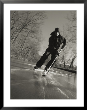 Ice Skater With A Hockey Stick On The Frozen C And O Canal by Skip Brown Pricing Limited Edition Print image