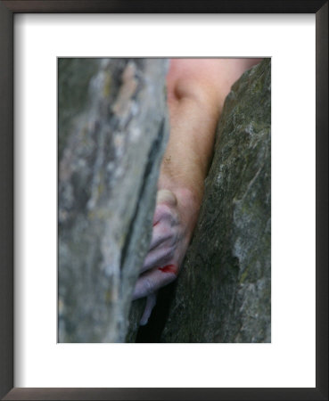 Rock Climber Jams His Hand Into A Crevice While Climbing by Skip Brown Pricing Limited Edition Print image