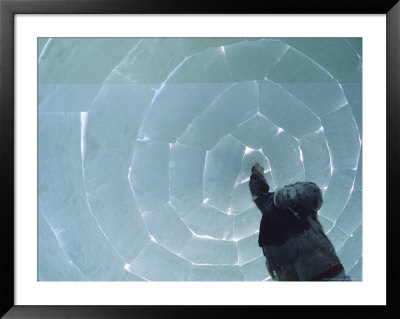 A Man Places The Last Block In An Igloo He Is Constructing by Norbert Rosing Pricing Limited Edition Print image
