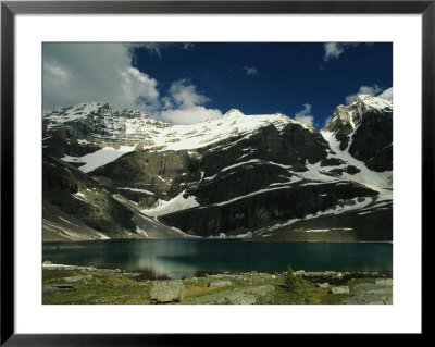 A Scenic View Of Lake Oesa In Yoho National Park by Michael Melford Pricing Limited Edition Print image