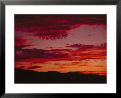 Twilight View Of A Landscape With Clouds by Kenneth Garrett Pricing Limited Edition Print image