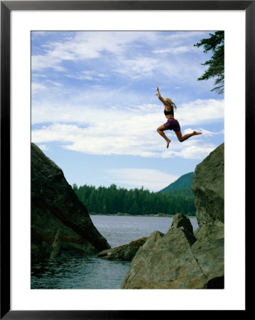 A Climber Freefalls From A Cliff Into The Claquot Sound In British Columbia by Barry Tessman Pricing Limited Edition Print image