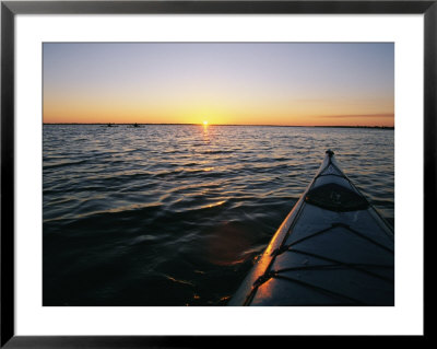 Kayak Sits In The Marsh Around Carrot Island Before Sunset by Stephen Alvarez Pricing Limited Edition Print image