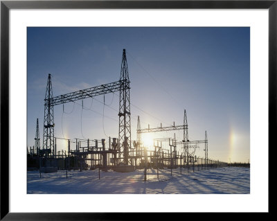 A Twilight View Of Sunlight Passing Through An Electric Substation by Norbert Rosing Pricing Limited Edition Print image