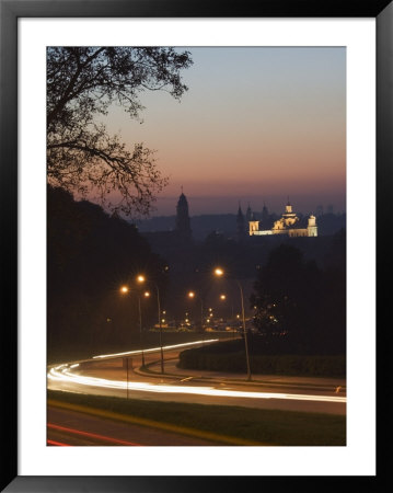 Car Light Trails At Night, View Of Old Town And City Centre, Vilnius by Christian Kober Pricing Limited Edition Print image