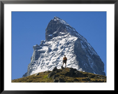 Hiker Below The Peak Of The Matterhorn, 4477M, Zermatt Alpine Resort, Valais, Switzerland by Christian Kober Pricing Limited Edition Print image