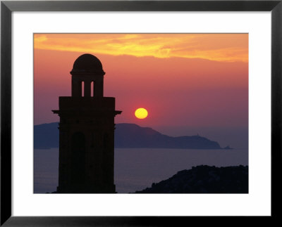Silhouette Of A Church And The Punta Della Revallata Against A Setting Sun, Lumio, Corsica, France by David Tomlinson Pricing Limited Edition Print image