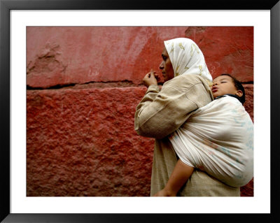 Mother And Child In The Narrow Alleys Of The Kasbah, Marrakesh, Morocco by Doug Mckinlay Pricing Limited Edition Print image