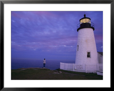 A Lighthouse Visitor Enjoys A Twilight View Of The Maine Coast by Stephen St. John Pricing Limited Edition Print image