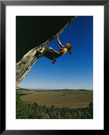 Young Woman Climbing The Rock Feature Called Bobcat Logic by Bobby Model Pricing Limited Edition Print image