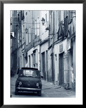 Fiat Driving In Narrow Street, Sassari, Sardinia, Italy by Doug Pearson Pricing Limited Edition Print image