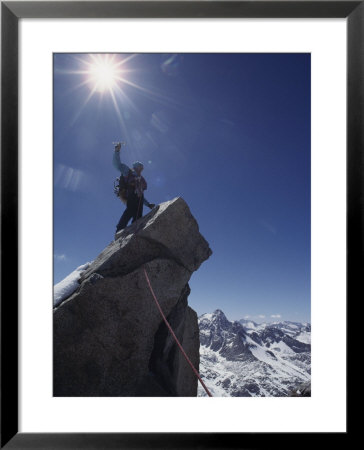 A Mountaineer Atop Mt by Gordon Wiltsie Pricing Limited Edition Print image