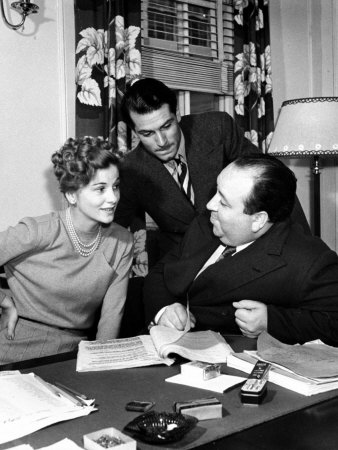 Dir. Alfred Hitchcock Discussing Script For Movie Rebecca With Joan Fontaine And Laurence Olivier by Peter Stackpole Pricing Limited Edition Print image