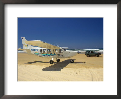Plane And Four Wheel Drive, Seventy Five Mile Beach, Fraser Island, Queensland, Australia by David Wall Pricing Limited Edition Print image