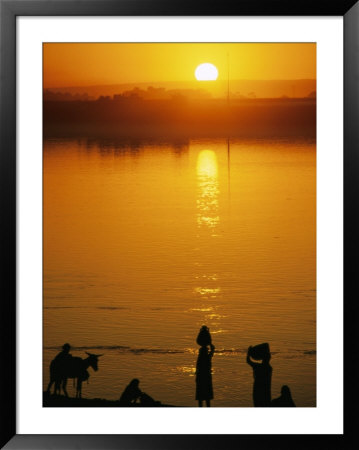 People On The Shore Of The Nile At Sunrise by Jonathan Blair Pricing Limited Edition Print image