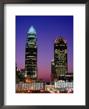 Bank Of America Corporate Center (Left) And Hearst Tower At Dusk, Charlotte, Usa by Richard Cummins Pricing Limited Edition Print image