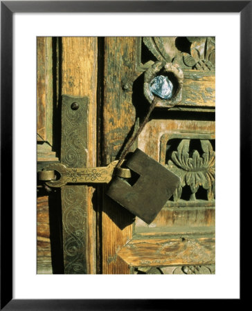 A Doorway With An Ornately Carved Latch And Window by Ed George Pricing Limited Edition Print image