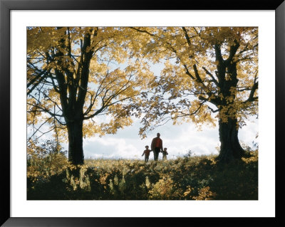 A Father Holds The Hands Of His Two Sons While On A Walk by Joseph Baylor Roberts Pricing Limited Edition Print image