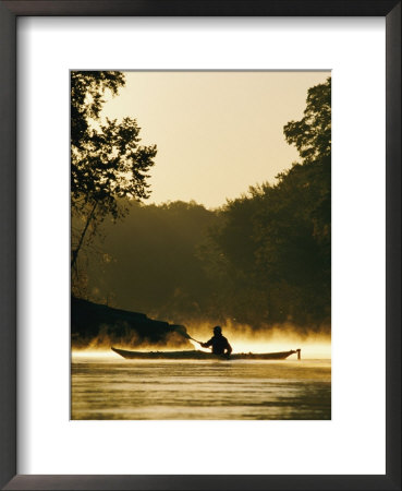 A Kayaker Paddles The River In A Morning Mist by Skip Brown Pricing Limited Edition Print image
