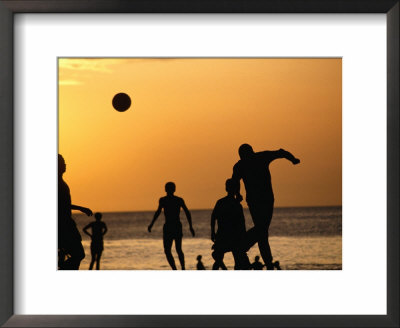 Soccer Game On Beach At Sunset, Zanzibar Town, Zanzibar Island, Zanzibar West, Tanzania by Lawrence Worcester Pricing Limited Edition Print image