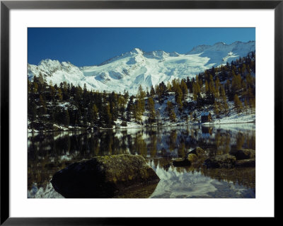Reed Lake With Mountains In Background, Austrian Alps by Walter Geiersperger Pricing Limited Edition Print image