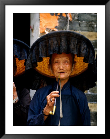 Portrait Of Hakka Woman Smoking Pipe, Looking At Camera, Hong Kong by Lee Foster Pricing Limited Edition Print image