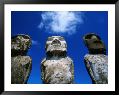 Traditional Moai Carved From Soft Volcanic Rock With Clouds Above, Ahu Tongariki, Chile by Brent Winebrenner Pricing Limited Edition Print image