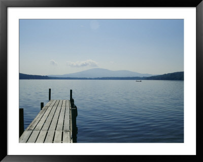 A Dock Juts Into The Serene Water Of Lake Pleasant by Stacy Gold Pricing Limited Edition Print image