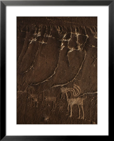 Indian Petroglyph Depicting A Mountain Sheep by Paul Chesley Pricing Limited Edition Print image