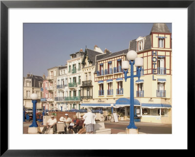 Group Of Elderly People Sitting On Seafront In The Restort Town Of Mers Les Bains, Picardy, France by David Hughes Pricing Limited Edition Print image