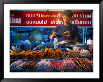 Night-Time Food Stall On The Waterfront, Surat Thani, Thailand by Joe Cummings Pricing Limited Edition Print image