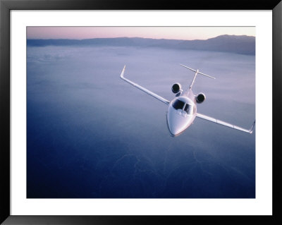 Lear Jet In Flight by Garry Adams Pricing Limited Edition Print image