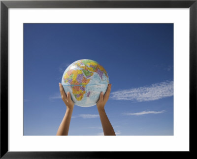 Woman's Hands Holding Globe, Death Valley National Park, California by Angelo Cavalli Pricing Limited Edition Print image