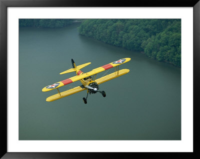 Vintage Stearman 43 Biplane Flies Over The Elk River by Stephen Alvarez Pricing Limited Edition Print image