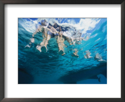 Boaters Dangle Their Feet In The Caribbean Sea by Heather Perry Pricing Limited Edition Print image
