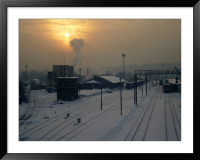 Snow-Covered Train Station At Dawn, Kaunas, Lithuania by Jonathan Smith Pricing Limited Edition Print image